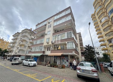 Недорогая вторичная недвижимость: квартира 2+1 с отдельной кухней, 115м², в 250м от моря в Махмутларе, Алания ID-18910 фото-1