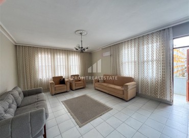 Недорогая вторичная недвижимость: квартира 2+1 с отдельной кухней, 115м², в 250м от моря в Махмутларе, Алания ID-18910 фото-2