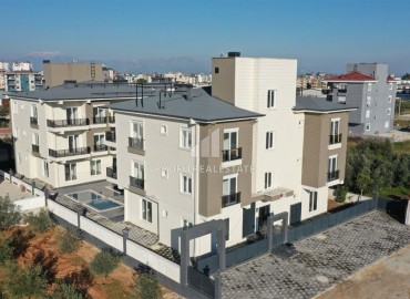 Новая квартира с одной спальней, 50м², в новостройке с комфортной инфраструктурой в Анталии, район Кепез ID-18914 фото-1