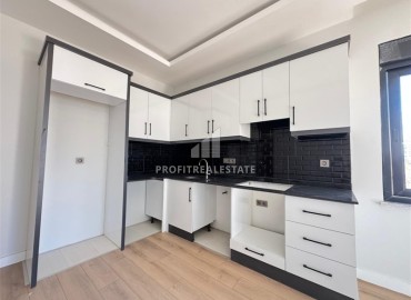 Двухкомнатная квартира, 55м², в резиденции с хорошей инфраструктурой в 500м от моря в Махмутларе, Алания ID-18917 фото-3