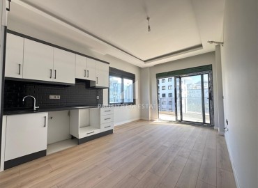 Двухкомнатная квартира, 55м², в резиденции с хорошей инфраструктурой в 500м от моря в Махмутларе, Алания ID-18917 фото-4