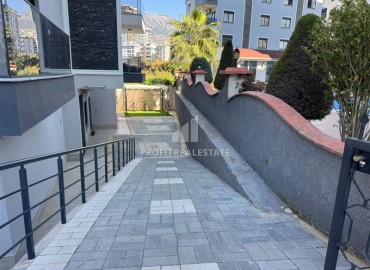 Двухкомнатная квартира, 55м², в резиденции с хорошей инфраструктурой в 500м от моря в Махмутларе, Алания ID-18917 фото-15