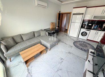 Уютная квартира с одной спальней, 55м² в современной резиденции с хорошей инфраструктурой в Махмутларе, Алания ID-18920 фото-3