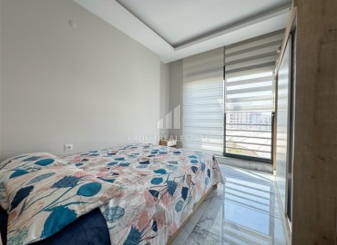 Уютная квартира с одной спальней, 55м² в современной резиденции с хорошей инфраструктурой в Махмутларе, Алания ID-18920 фото-7