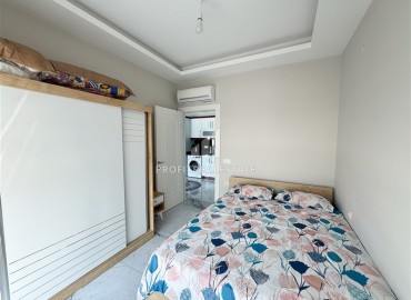 Уютная квартира с одной спальней, 55м² в современной резиденции с хорошей инфраструктурой в Махмутларе, Алания ID-18920 фото-8