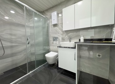 Уютная квартира с одной спальней, 55м² в современной резиденции с хорошей инфраструктурой в Махмутларе, Алания ID-18920 фото-9