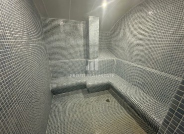 Уютная квартира с одной спальней, 55м² в современной резиденции с хорошей инфраструктурой в Махмутларе, Алания ID-18920 фото-15