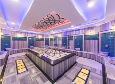 Укомплектованная двухкомнатная квартира, 65м², в комплексе премиум класса в 200м от моря в районе Кестель, Алания ID-18923 фото-20