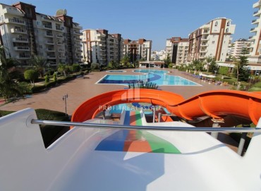 Уютная квартира 1+1 с остекленным балконом, 70м², в элитном комплексе в Авсалларе, Алания, в 600м от моря ID-18925 фото-1