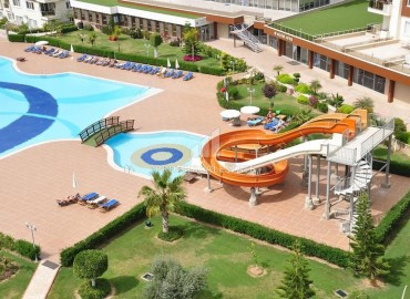 Уютная квартира 1+1 с остекленным балконом, 70м², в элитном комплексе в Авсалларе, Алания, в 600м от моря ID-18925 фото-18