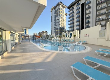 Квартира с одной спальней, 54м², на высоком этаже в элитной резиденции в Махмутларе, Алания, в 750м от моря ID-18926 фото-13