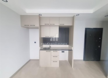 Новая двухкомнатная квартира, 50м², в доме с парковкой в Анталии, район Кепез, Каршияка, по выгодной цене ID-18927 фото-2