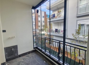 Новая двухкомнатная квартира, 50м², в доме с парковкой в Анталии, район Кепез, Каршияка, по выгодной цене ID-18927 фото-9