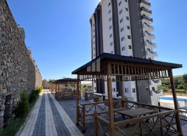 Стильные апартаменты с одной спальней, 65м², с видом на Аланийскую крепость в резиденции премиум класса в районе Махмутлар, Алания ID-18935 фото-17