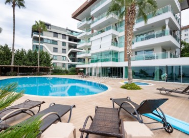 Элегантные видовые трехкомнатные апартаменты, 110м², на первой береговой линии в Каргыджаке, Алания ID-18936 фото-1