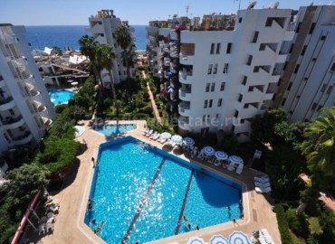 Квартира с двумя спальнями на первом турецком этаже в 50 метрах от Средиземного моря по очень выгодной цене. ID-1489 фото-1