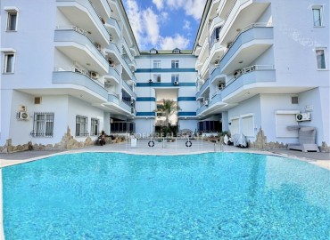 Трехкомнатные меблированные апартаменты, 100м², в комплексе с бассейном, у моря в районе Оба, Алания под ВНЖ ID-18941 фото-1