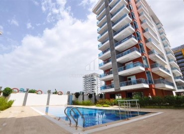 Квартира с двумя спальнями, 105м², в комплексе с инфраструктурой в 350м от моря в районе Махмутлар, Алания. ID-18945 фото-1