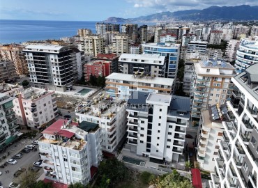 Квартиры на этапе проекта по самым низким ценам застройщика, всего в 300 метрах от моря. Новый инвестиционный проект в Махмутларе, Аланья ID-8903 фото-1