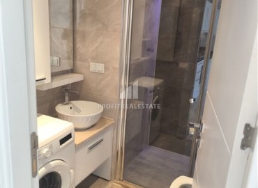 Меблированная двухкомнатная квартира, 55м², в центре Алании в комплексе с инфраструктурой ID-18948 фото-8