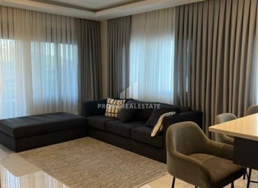 Трехкомнатные апартаменты с дизайнерским интерьером, 100м², в новостройке премиум класса в районе Алании Тепе ID-18950 фото-1