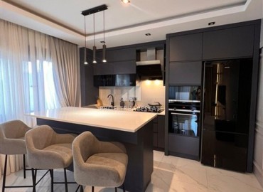 Трехкомнатные апартаменты с дизайнерским интерьером, 100м², в новостройке премиум класса в районе Алании Тепе ID-18950 фото-5