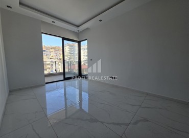 Апартаменты с одной спальней, 55м², в новостройке с хорошей инфраструктурой в 600м от моря в Махмутларе, Алания ID-18955 фото-2