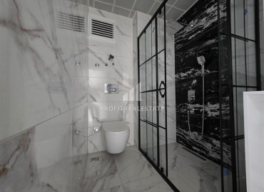 Апартаменты с одной спальней, 55м², в новостройке с хорошей инфраструктурой в 600м от моря в Махмутларе, Алания ID-18955 фото-6