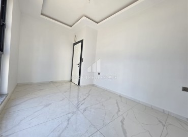 Апартаменты с одной спальней, 55м², в новостройке с хорошей инфраструктурой в 600м от моря в Махмутларе, Алания ID-18955 фото-8