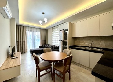 Уютная квартира с одной спальней, 55м², с видом на горы в комплексе премиум класса, в центральной части Махмутлара, Алания ID-18956 фото-3