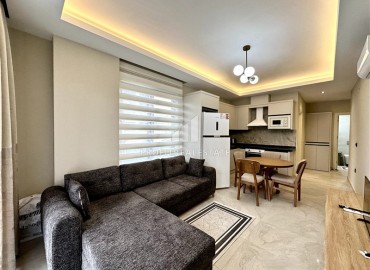 Уютная квартира с одной спальней, 55м², с видом на горы в комплексе премиум класса, в центральной части Махмутлара, Алания ID-18956 фото-5