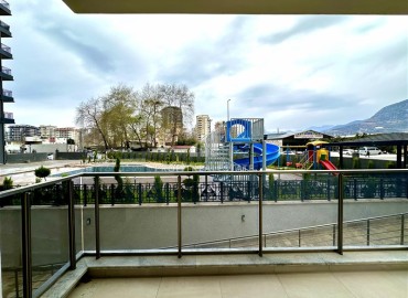 Уютная квартира с одной спальней, 55м², с видом на горы в комплексе премиум класса, в центральной части Махмутлара, Алания ID-18956 фото-14