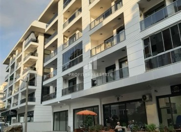 Элегантная квартира с одной спальней, 55м². в новостройке в районе вторничного рынка в Махмутларе, Алания ID-18957 фото-1