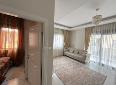 Элегантная квартира с одной спальней, 55м². в новостройке в районе вторничного рынка в Махмутларе, Алания ID-18957 фото-5