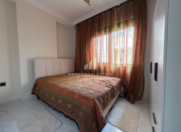 Элегантная квартира с одной спальней, 55м². в новостройке в районе вторничного рынка в Махмутларе, Алания ID-18957 фото-6