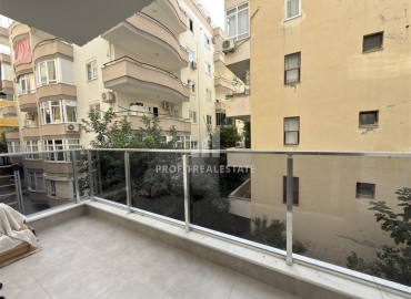 Элегантная квартира с одной спальней, 55м². в новостройке в районе вторничного рынка в Махмутларе, Алания ID-18957 фото-9