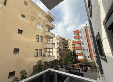 Элегантная квартира с одной спальней, 55м². в новостройке в районе вторничного рынка в Махмутларе, Алания ID-18957 фото-10