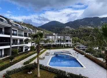 Трехкомнатные апартаменты с дизайнерским интерьером, 100м², в новостройке премиум класса в районе Алании Тепе ID-18950 фото-1