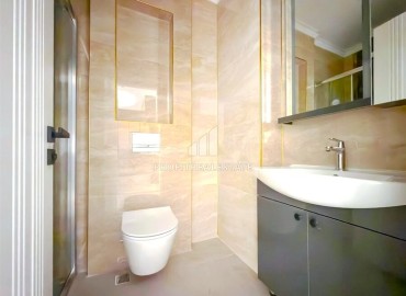 Элитная надвижимость в Махмутларе, Алания: двухкомнатные апартаменты, 68м², с видом на горы в фешенебельном комплексе ID-18970 фото-6