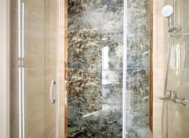 Элитная надвижимость в Махмутларе, Алания: двухкомнатные апартаменты, 68м², с видом на горы в фешенебельном комплексе ID-18970 фото-7