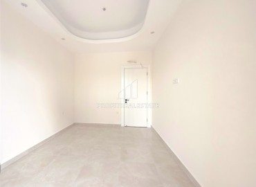 Элитная надвижимость в Махмутларе, Алания: двухкомнатные апартаменты, 68м², с видом на горы в фешенебельном комплексе ID-18970 фото-8