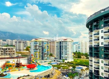 Элитная надвижимость в Махмутларе, Алания: двухкомнатные апартаменты, 68м², с видом на горы в фешенебельном комплексе ID-18970 фото-13