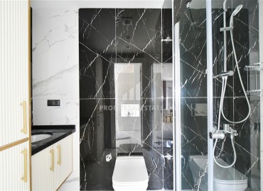 Видовая квартира с двумя спальнями, 78м², с дизайнерским интерьером в элитной резиденции в районе Оба. Алания ID-18973 фото-10