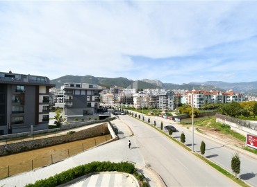 Видовая квартира с двумя спальнями, 78м², с дизайнерским интерьером в элитной резиденции в районе Оба. Алания ID-18973 фото-13