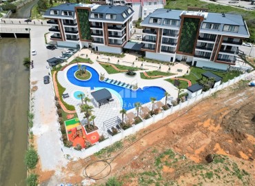 Видовая квартира с двумя спальнями, 78м², с дизайнерским интерьером в элитной резиденции в районе Оба. Алания ID-18973 фото-14