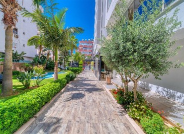 Просторная меблированная двухкомнатная квартира, 60м², в центре Махмутлара, Алания, в 300м от побережья ID-18975 фото-20