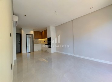 Апартаменты с одной спальней, 55м², с бытовой техникой в новостройке с бассейном у пляжа Клеопатры, Алания ID-18980 фото-2