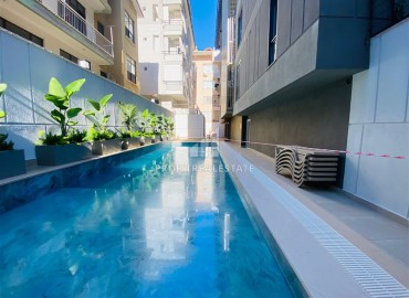 Апартаменты с одной спальней, 55м², с бытовой техникой в новостройке с бассейном у пляжа Клеопатры, Алания ID-18980 фото-14