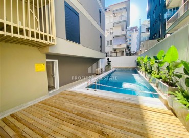 Апартаменты с одной спальней, 55м², с бытовой техникой в новостройке с бассейном у пляжа Клеопатры, Алания ID-18980 фото-18