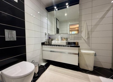 Квартира с двумя спальнями, 97м², в комплексе с зимним бассейном в районе Алании Оба в 300м от побережья под ВНЖ ID-18982 фото-10